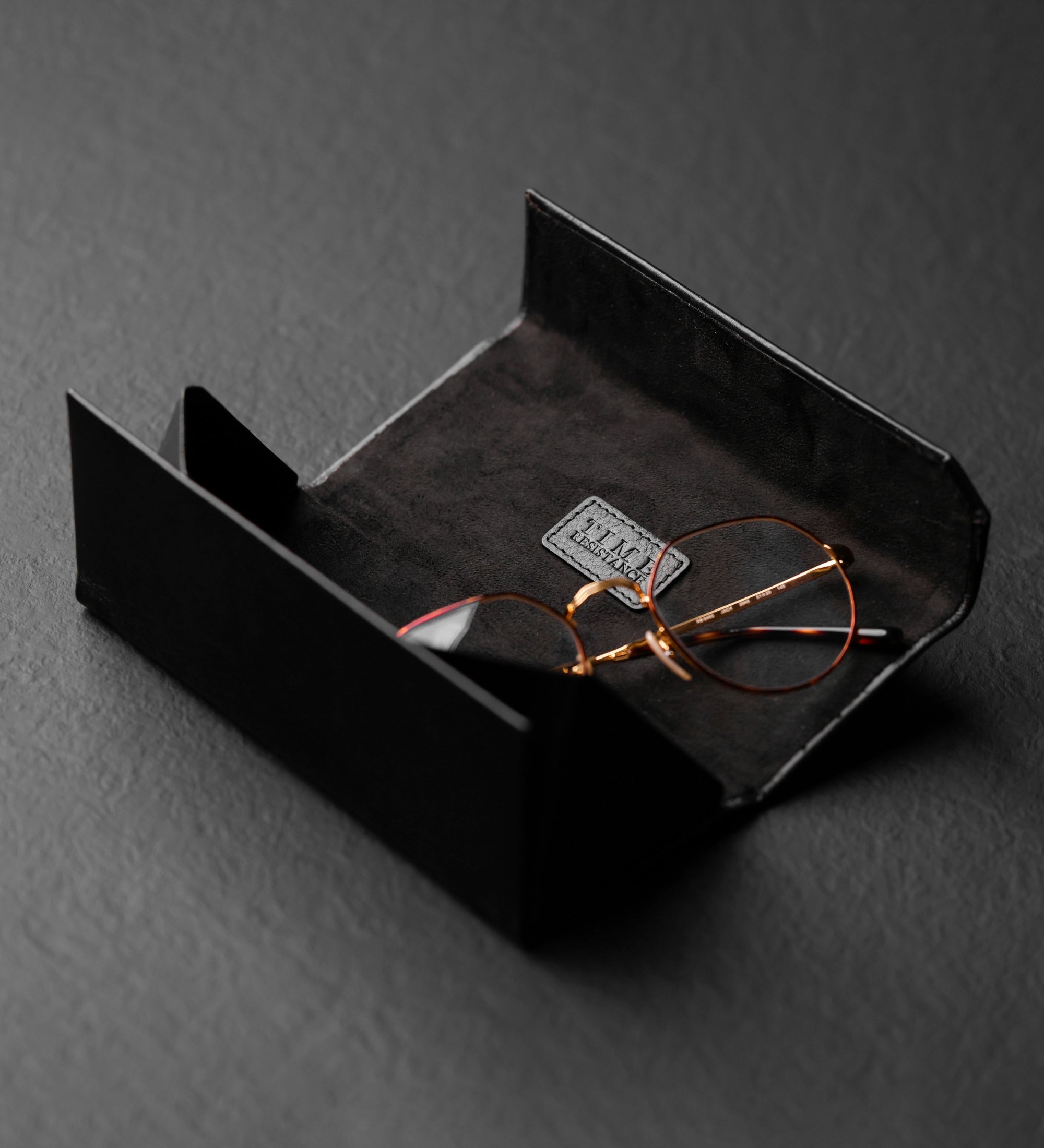 Étui à lunettes pliable en cuir The Riddle of the Sands